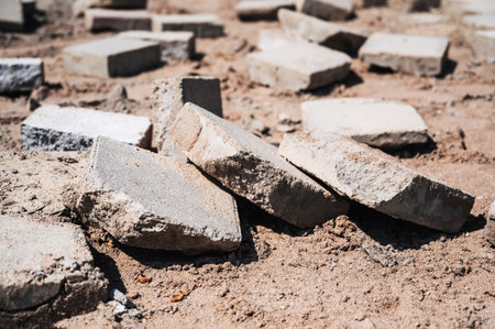 paving slabs on destroyed damaged pedestrian sidewalk close-up
