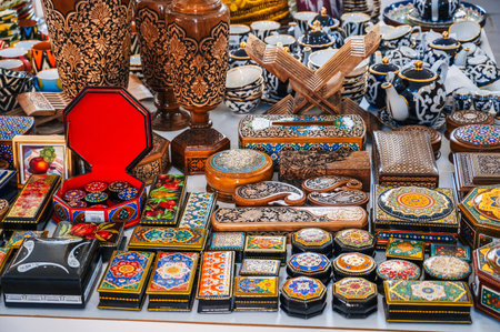 traditional handmade wooden carved Uzbek caskets hand-painted in oriental souvenir shop in...