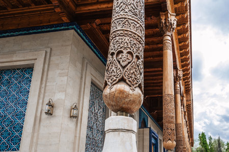 carved wooden colonnade with oriental pattern Uzbek ornament in Museum of Victims of Political Repression in Tashkentの写真素材