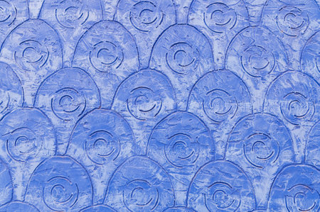 Background of blue plaster with a pattern