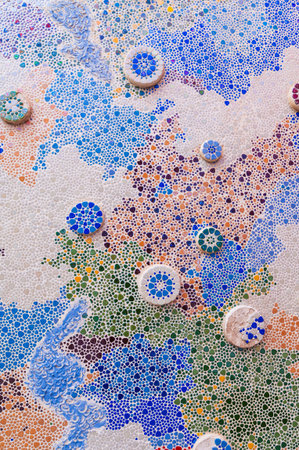 a pattern of colorful tiles and beads.