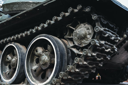 metal caterpillar track of old Soviet military tank in close-upの写真素材