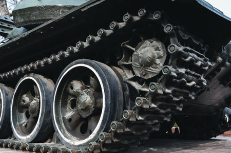metal old caterpillar track of military army metal Soviet tank in close upの写真素材