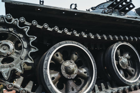 metal old caterpillar track of military army metal Soviet tank in close upの写真素材