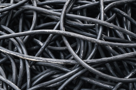 lots of black electrical cables in close-upの写真素材