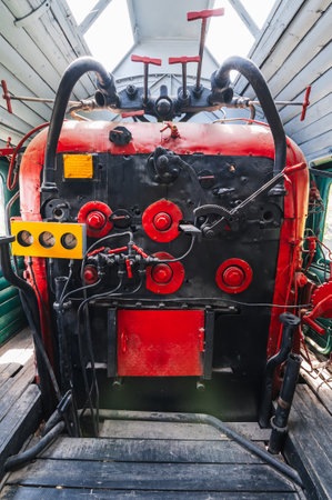 view of the boiler room in the drivers cabin of the old trainの写真素材