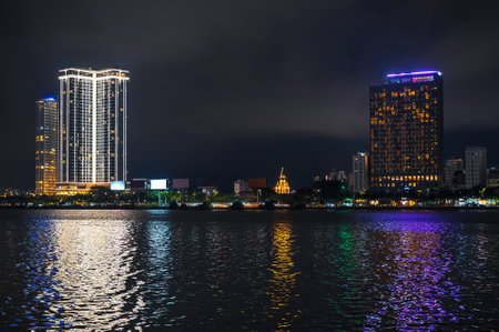 Night panorama of Da Nang city with Han River embankment and hotels skyscrapers on the shore at night in Vietnamの写真素材