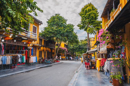 Ancient Asian streets in old town of Hoi An heritage city with historic houses in Vietnamese style. Hoi An, Vietnam - September 12, 2024のeditorial素材