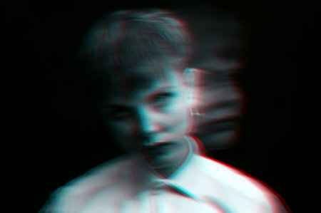 psychopath with mental disorders and insanity on a dark backgroundの写真素材