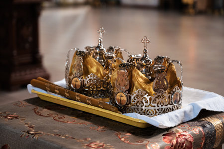 CHURCH OF THE RESURRECTION, VICHUGA, RUSSIA - JULY 17, 2022: Golden crowns for the Orthodox Christian wedding ceremony in churchのeditorial素材