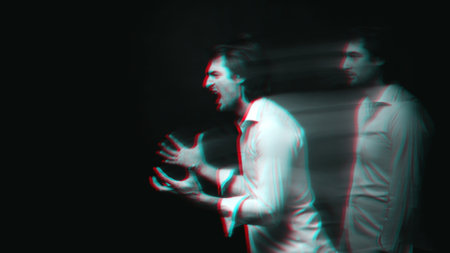 Abstract blurry portrait of a depressed man with mental personality disordersの写真素材