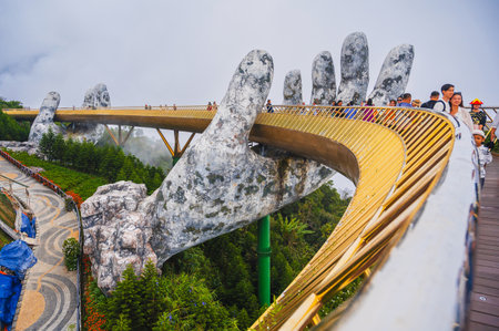 Golden Bridge is also known as the Hands of God in Ba Na Hills Park in Da Nang on mountain. Da Nang, Vietnam - September 13, 2024のeditorial素材