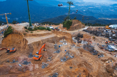 construction site with excavators and other heavy construction equipment. Quarry with foundation preparationの写真素材