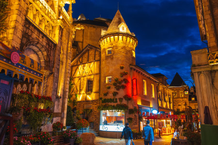 Street of medieval stone city in Ba Na Hills Park in Da Nang in Vietnam at nightの写真素材