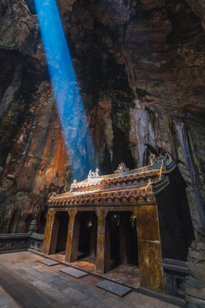 Asian Buddhist temple inside Huyen Khong Cave in the Marble Mountains in Da Nang, Vietnamの写真素材