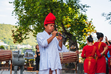 Portrait of a Vietnamese male musician playing a pipe at a celebration at Po Nagar Cham Towers in Nha Trang. Nha Trang, Vietnam - August 8, 2024のeditorial素材