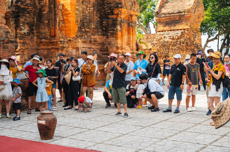 Crowd of Asian tourists at Po Nagar Cham Towers in Nha Trang in Asia. Nha Trang, Vietnam - August 8, 2024のeditorial素材