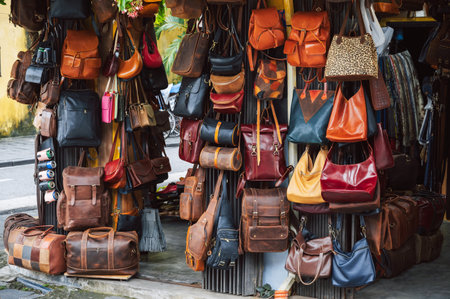 leather bags and accessories store in Hoi An market in Vietnamの写真素材