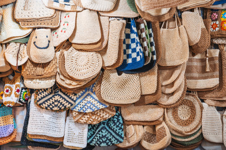 summer beach woven female bags on counter in Asian market in Vietnamの写真素材
