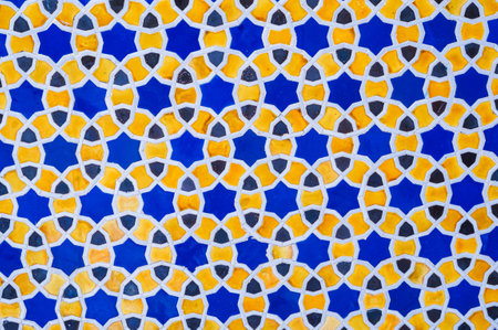 yellow and blue ceramic tiles with an abstract geometric pattern. Background with uzbek ornamentの写真素材