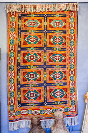 oriental Uzbek carpet with a traditional geometric pattern. Vintage luxury handmade asian carpet in Uzbekistanの写真素材