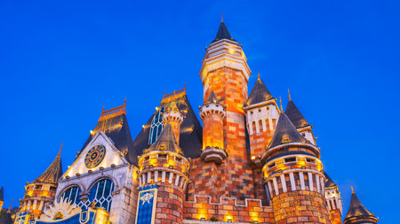 roof beautiful stone medieval castle at entertainment park in Nha Trang in Vietnam on background of blue skyの写真素材