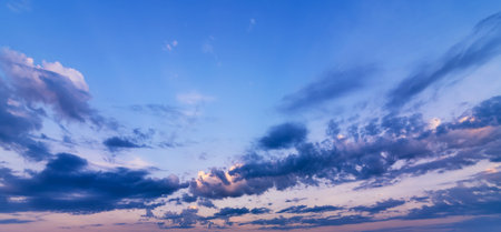 A panorama with beautiful sunset sky with clouds. Background with sky at dawn