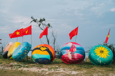 Painted round traditional fishing Vietnamese boats Thung Chai in Murals Paintings Villageの写真素材