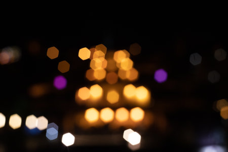 A mesmerizing blur of vibrant lights illuminate the night sky in Yerevan, Armenia, creating a mystical and captivating cityscape.の写真素材
