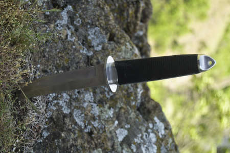 Tanto knife stuck in ground