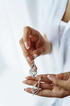 Wedding decorations of the bride. Handmade earrings.の写真素材