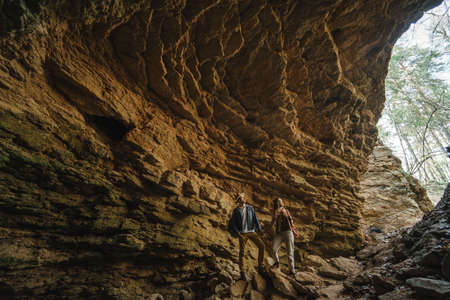 A man and a woman in a cave, a journeyの写真素材
