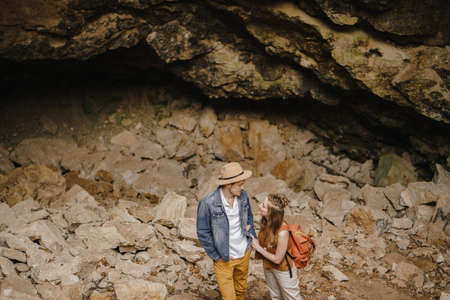 A man and a woman in a cave, a journey