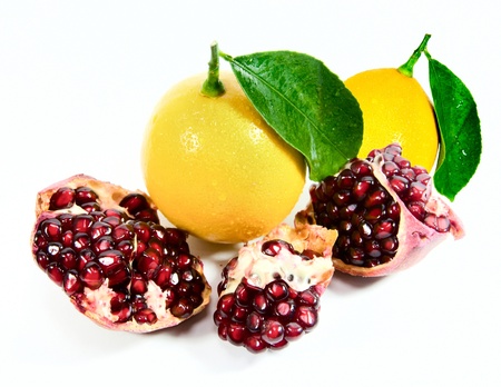 lemons and parts of pomegranateの写真素材