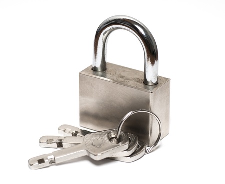 Metal suitcase padlock with keys on a ring isolated on white background.