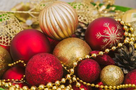 gold and red Christmas balls and beadsの写真素材