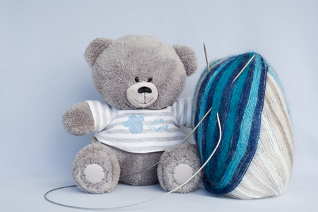 teddy bear and yarnsの写真素材