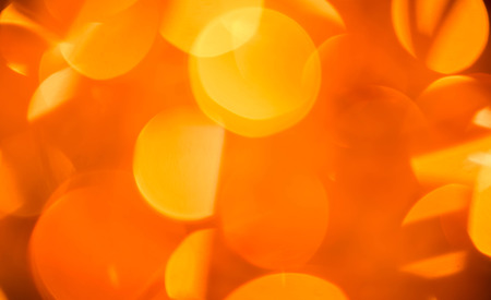 Christmas background with round yellow glare garlandsの写真素材