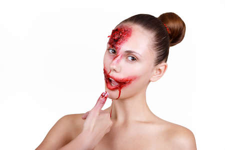 pretty girl with bloody make upの写真素材