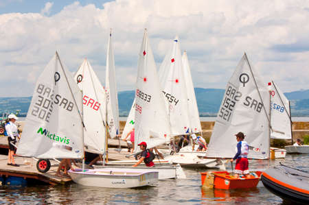 Golubac, Serbia - June 05, 2016, The end of the race in Golubac regatta. The kids are docking their...