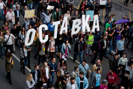 Belgrade, Serbia - May 25, 2016, Protest against Belgrade Waterfront and recent happening in Savamala. People are holding letters of the word Resign in Serbian.のeditorial素材