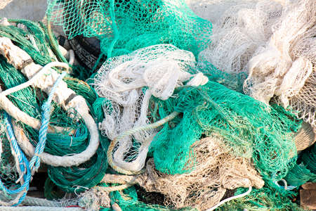 Bunch of old weathered trawl fishing net background
