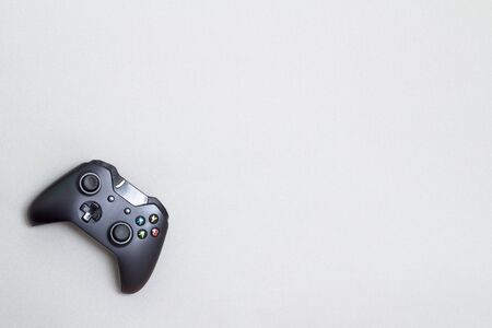 Black one x gamepad on the grey background from above.の写真素材