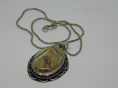 Vintage silver pendant with a big stoneの写真素材