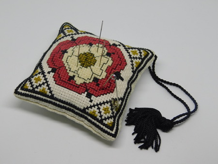 Embroidered cushion pilow for needles and pinsの写真素材