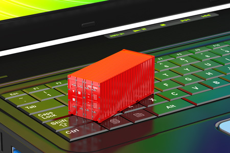 Shipping, delivery and logistic concept with cargo container and laptop