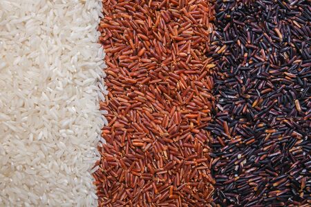 red, black and white rice background or textureの写真素材