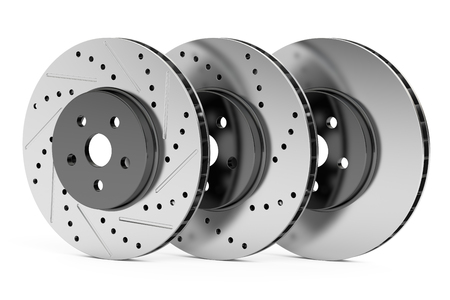 Car discs brake rotors, drilled, slotted, non-drilled, 3D rendering isolated on white backgroundの写真素材