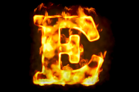 Fire letter E of burning flame light, 3D rendering isolated on black backgroundの写真素材