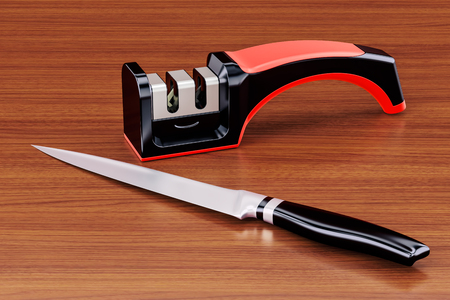 Knife with knife sharpener on the wooden table. 3D renderingの写真素材